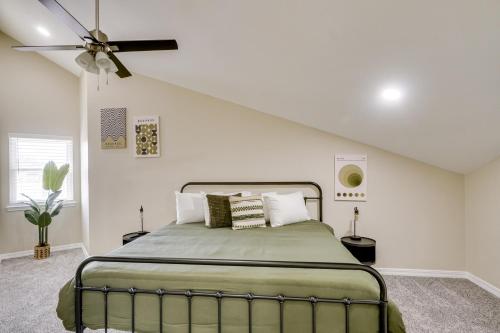 a bedroom with a bed and a ceiling fan at Outdoor Entertainment Area Spacious Midland Home! in Midland