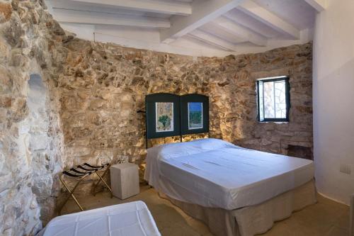 Postel nebo postele na pokoji v ubytování Feudo - Pajara Curte 3 by Salento Prime