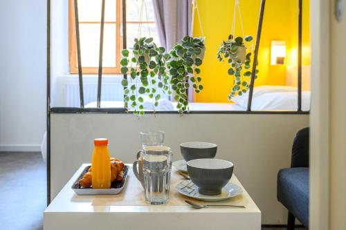 a table with a tray of food on it at Le Viette in Montbéliard