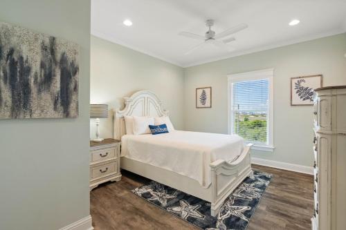 Ένα ή περισσότερα κρεβάτια σε δωμάτιο στο Sunshine Bay Beach House