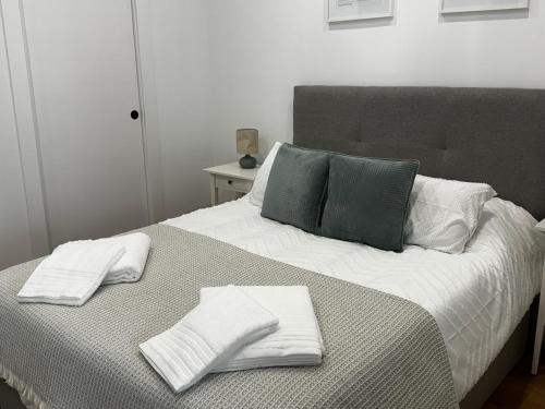 Postel nebo postele na pokoji v ubytování Apartamentos Alimarc Urban