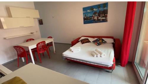 Ένα ή περισσότερα κρεβάτια σε δωμάτιο στο Apartments Di Salvo