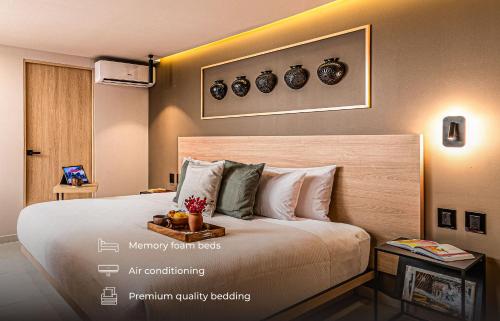 Ένα ή περισσότερα κρεβάτια σε δωμάτιο στο Kukun Roma