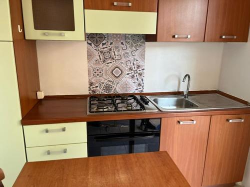 Kuchyň nebo kuchyňský kout v ubytování DFA Apartments