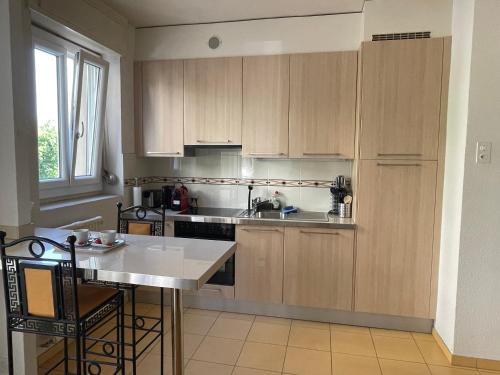 Küche/Küchenzeile in der Unterkunft Appartement à 9 minutes à pied de la gare de Lausanne