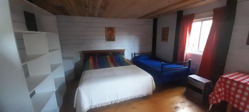 Postel nebo postele na pokoji v ubytování Ema Juan