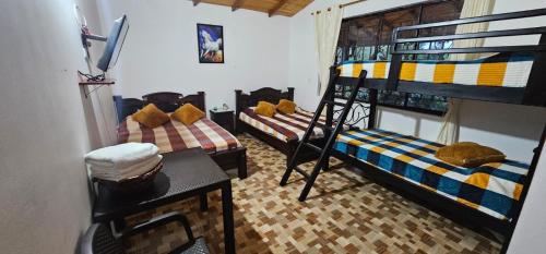 Katil atau katil-katil dalam bilik di Hospedaje Casona Villa Alicia