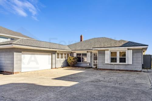 a large house with a garage at 1180 S Fletcher Ave in Fernandina Beach