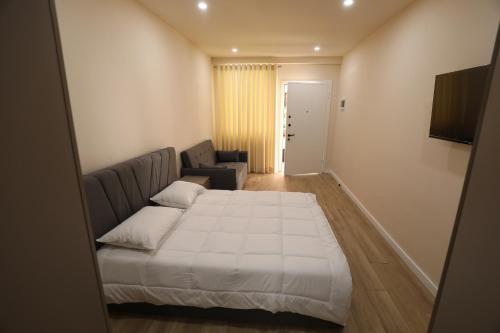 Ένα ή περισσότερα κρεβάτια σε δωμάτιο στο Hoy BNB Room 3