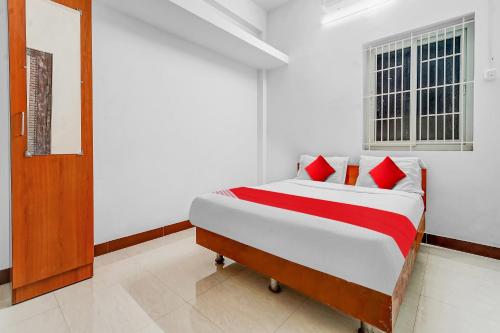 Postel nebo postele na pokoji v ubytování Hotel O Crown Tower