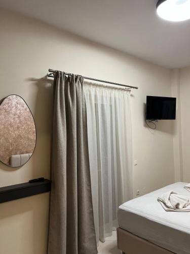 Amare suite 2にあるテレビまたはエンターテインメントセンター