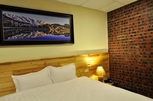 Кровать или кровати в номере Fansipan Terrace Cafe and Homestay