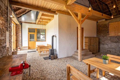 a room with a red fire hydrant in a building at Stodola 63 in Pacov
