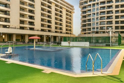 Πισίνα στο ή κοντά στο Valencia Beachfront Home 21