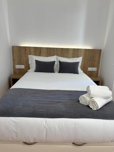 Postel nebo postele na pokoji v ubytování VC House Estúdios, Coimbra