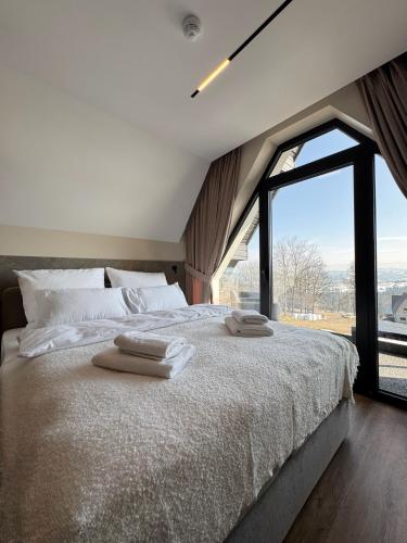 Una cama o camas en una habitación de Osada Jager