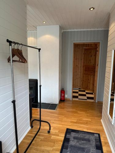 an empty room with a gym with a treadmill at Northern Dream Lofoten in Hovdan