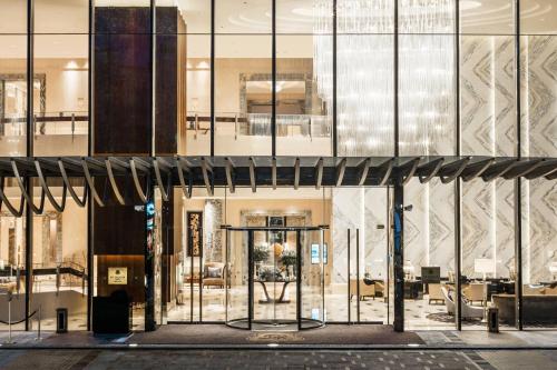 a view of a building with a revolving door at The St. Regis Chengdu in Chengdu