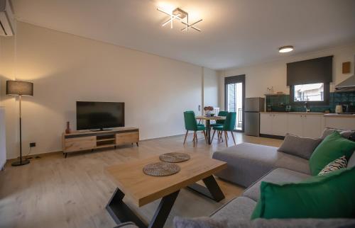 TV a/nebo společenská místnost v ubytování ELEMENT Suites