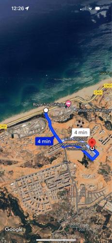 a map of a city and the ocean at Cité LPP in Skikda