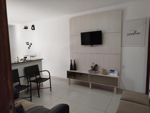 Μια τηλεόραση ή/και κέντρο ψυχαγωγίας στο Casa de veraneio - FA Beach
