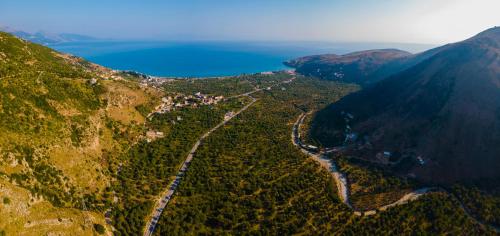 an aerial view of a mountain with a river at KAFUL APARTMENTS in Qeparo