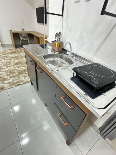 Dapur atau dapur kecil di Majestic Hospedagem 10