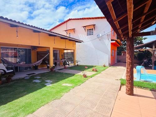 Bazén v ubytování Casa Temporada Suítes nebo v jeho okolí