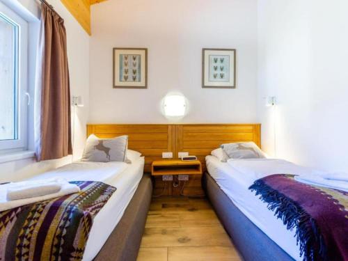 Posteľ alebo postele v izbe v ubytovaní Salzach Lodge