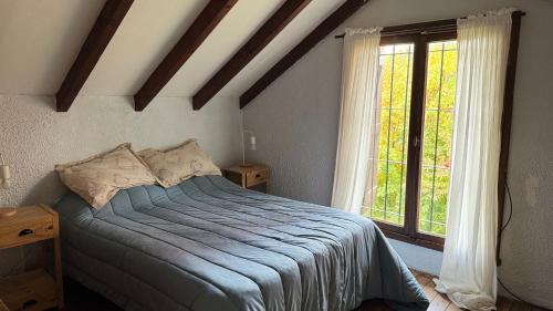 Postel nebo postele na pokoji v ubytování Naty