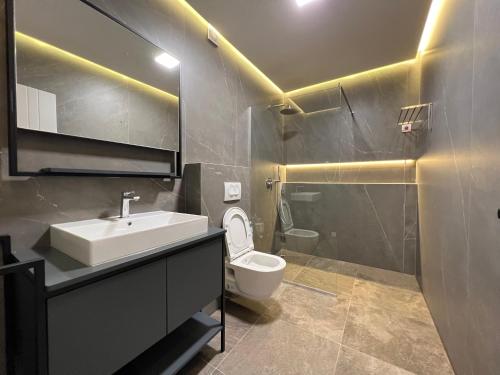 Koupelna v ubytování Apartament Koha