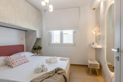 Postel nebo postele na pokoji v ubytování Italian Experience-Perla Costa Conero