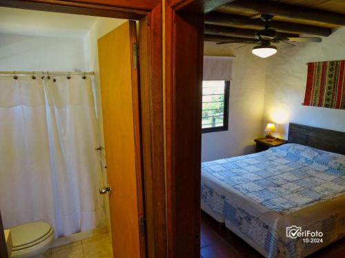 Postel nebo postele na pokoji v ubytování Bungalows Punta Colorada