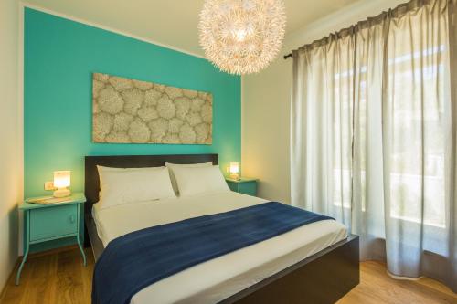 Posteľ alebo postele v izbe v ubytovaní Villa Manus - Boutique Apartments