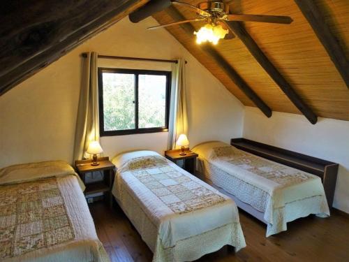 Postel nebo postele na pokoji v ubytování Bungalows Punta Colorada