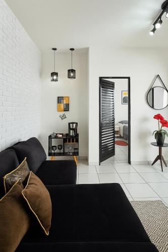 Χώρος καθιστικού στο Casa 4 min Centro, UFU, UMC, Camaru c Ar condicionado