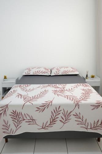 Ένα ή περισσότερα κρεβάτια σε δωμάτιο στο Casa 4 min Centro, UFU, UMC, Camaru c Ar condicionado