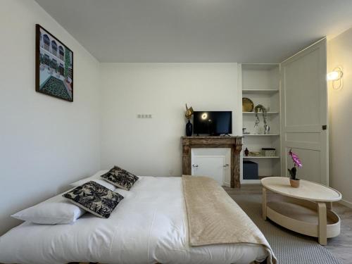 Postel nebo postele na pokoji v ubytování Apartment in Le Mans with Concierge Services