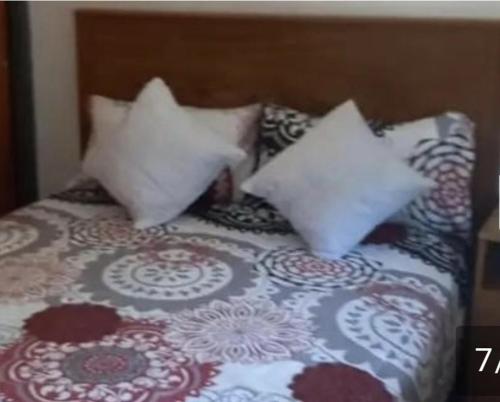 Ένα ή περισσότερα κρεβάτια σε δωμάτιο στο Apartamento en alquiler temporario en Buenos Aires