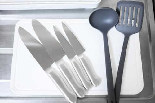 a group of utensils sitting in a drawer at CleanNest Hokkaido Chitose in Chitose