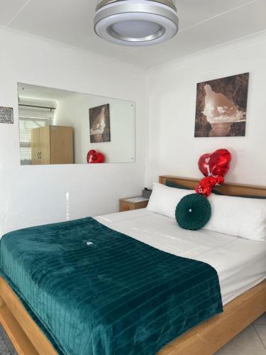 Ένα ή περισσότερα κρεβάτια σε δωμάτιο στο EasyStay Hideaway