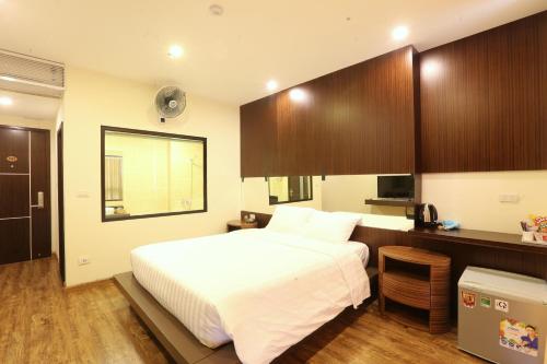Katil atau katil-katil dalam bilik di Au Viet Hotel