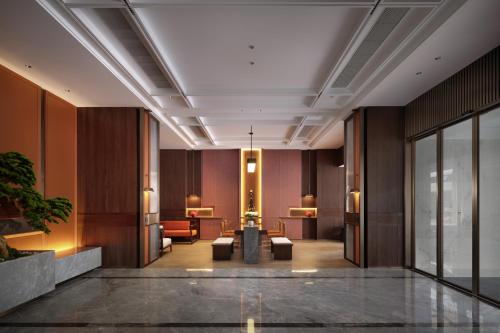 Coin salon dans l'établissement New Century Mansion Hotel Tongxiang Puyuan International Trade Center
