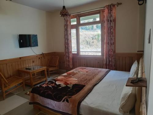 Ένα ή περισσότερα κρεβάτια σε δωμάτιο στο Leela Home - Full Mountain View