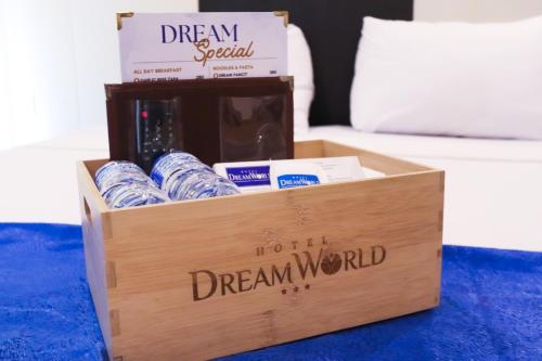a wooden box with a box of tooth dream world at Hotel Dreamworld North Edsa in Manila