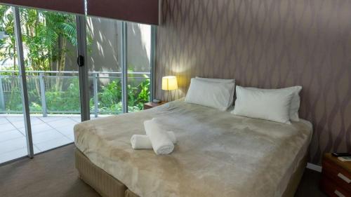 Cama o camas de una habitación en Vision Apartments