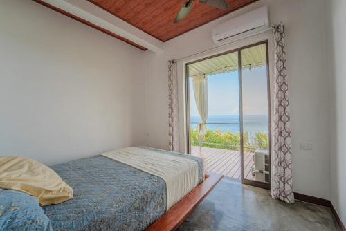 Postel nebo postele na pokoji v ubytování An apartment with an ocean view in Playa Islita