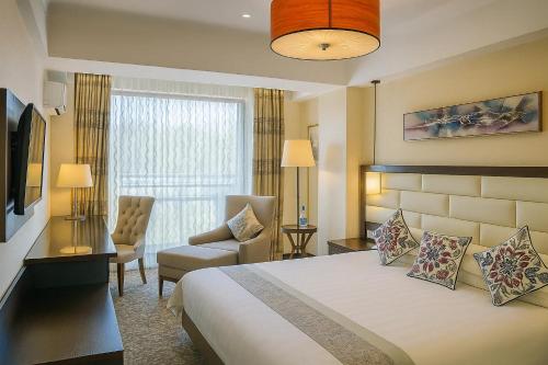 Voodi või voodid majutusasutuse Hotel Atlas toas