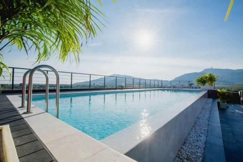 Πισίνα στο ή κοντά στο C212 Relaxing Condo Rooftop Pool & Ocean Views