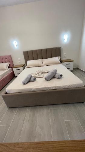 Ένα ή περισσότερα κρεβάτια σε δωμάτιο στο Alessio Beach House